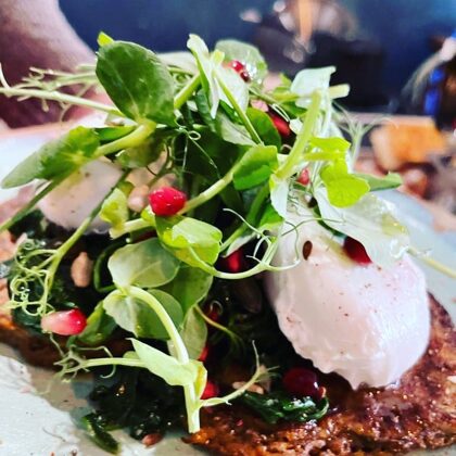 Sweetcorn Fritters, Poached Egg, pomegranate & Wild Garlic Spinach